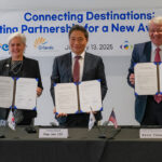 Osceola County Commissioner Cheryl Grieb, Lee Hag-jae, President & CEO of Incheon International Airport and Kevin J. Thibault, CEO of GOAA (l-r) display signed copies of the agreement Monday at NeoCity.